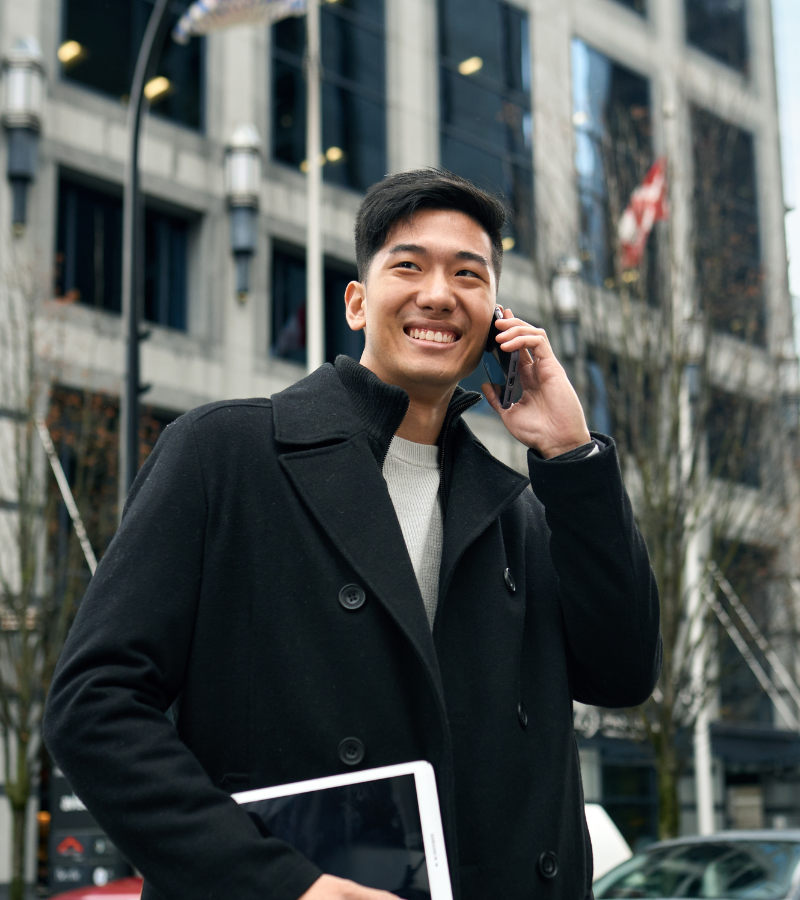 man outside talking on mobile phone man outside talking on mobile phone