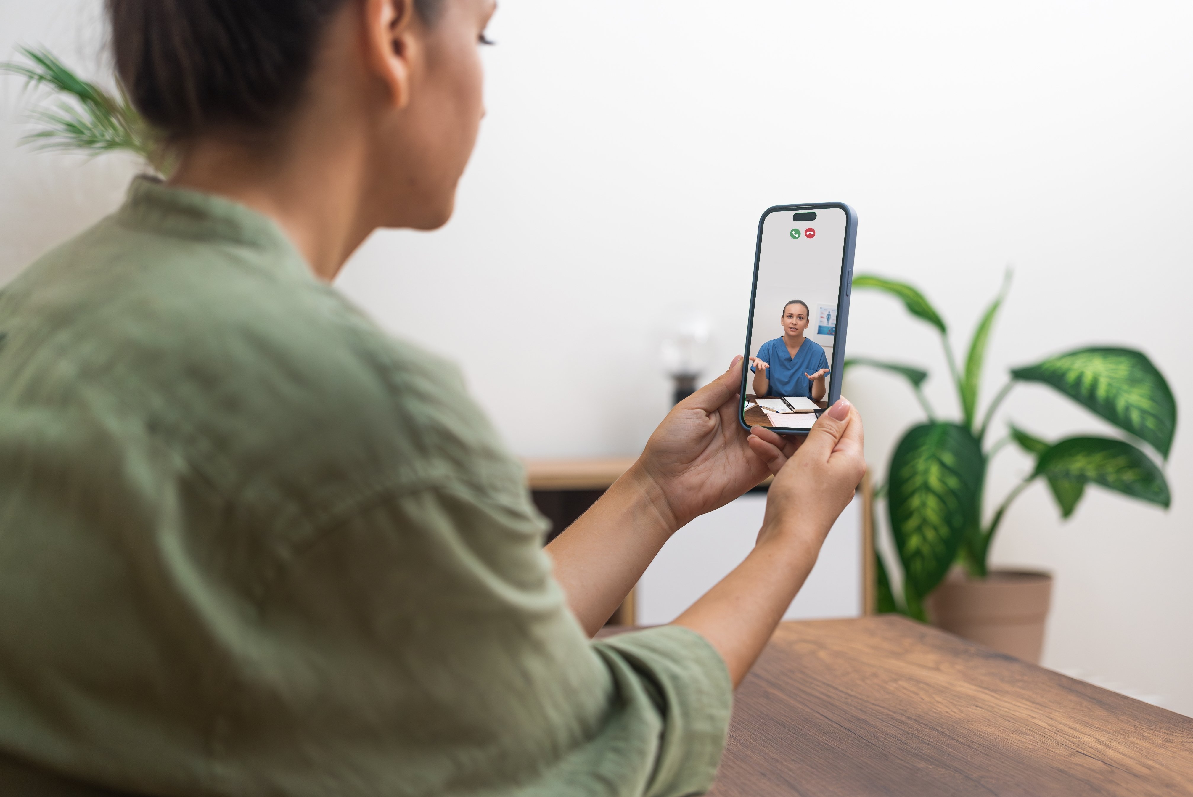 Woman speaking with a Revive Health Telehealth Primary Care Doctor