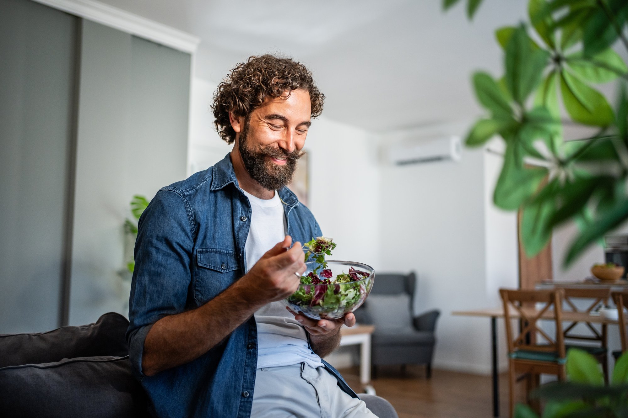 Man eating a salad Man eating a salad